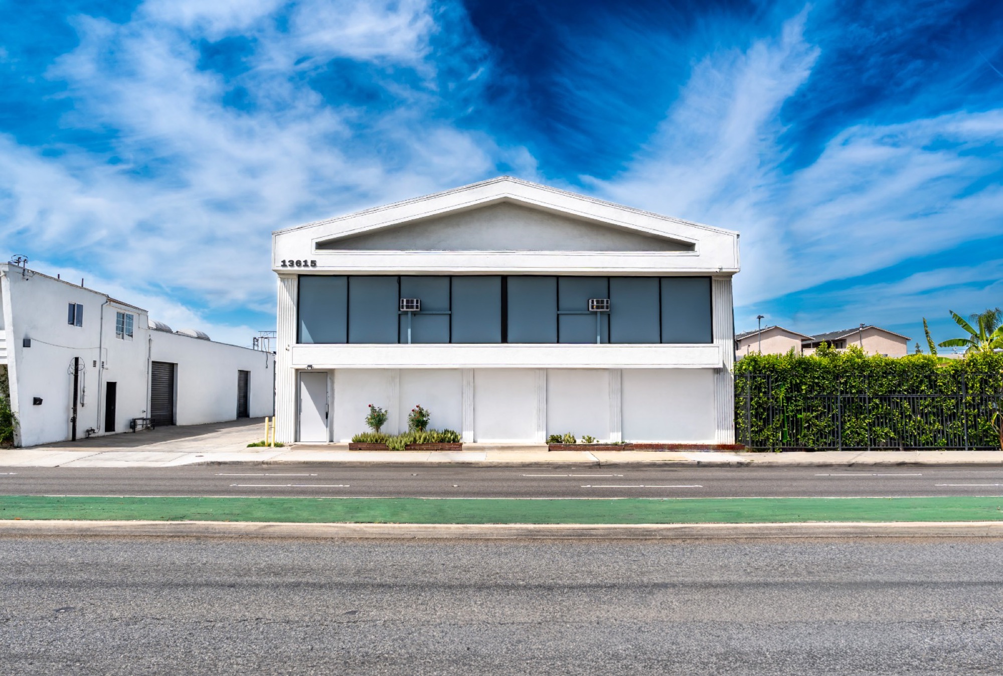 Daytime facade of commercial property — blue sky