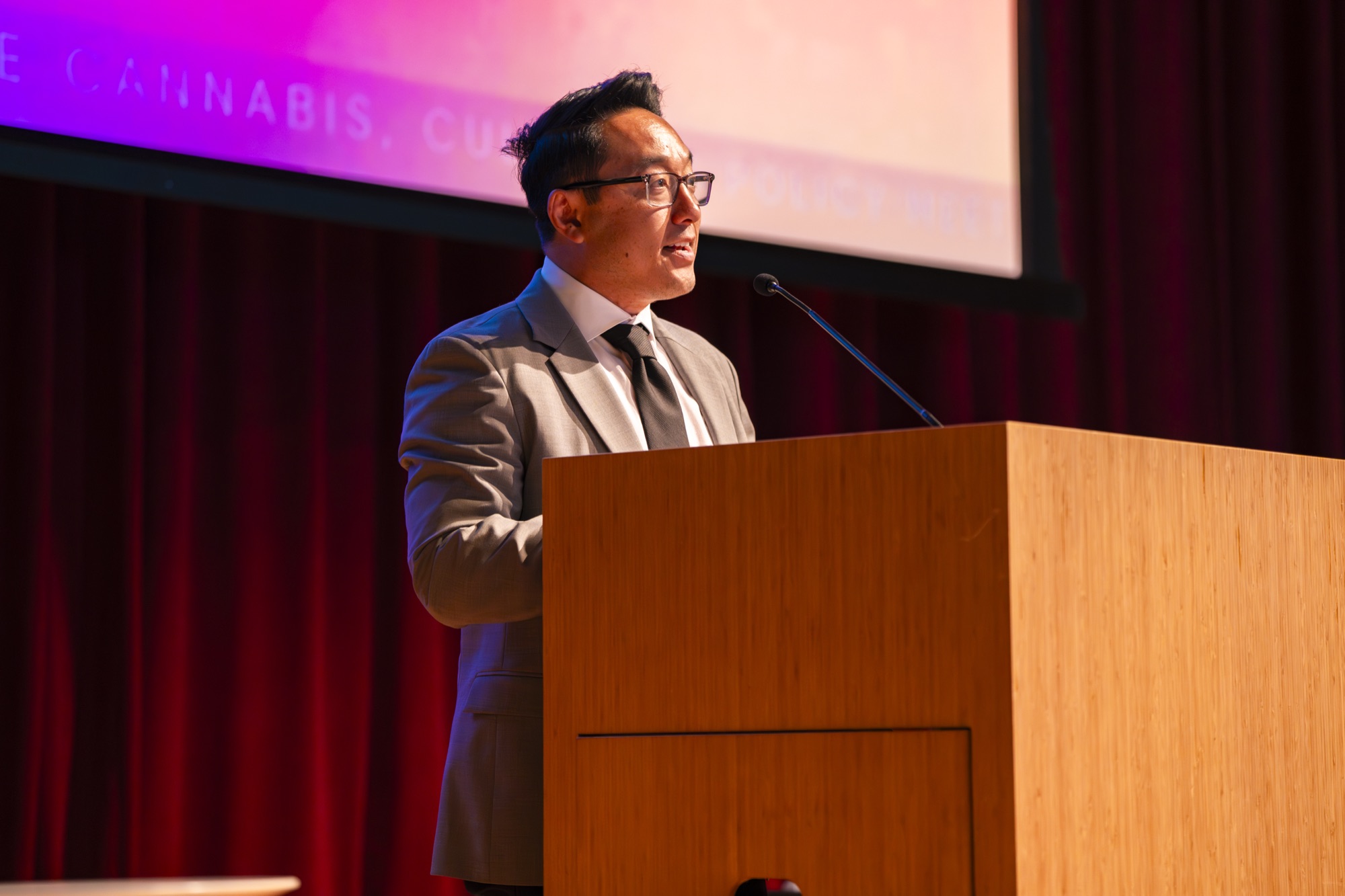 Speaker at podium — CCCC conference
